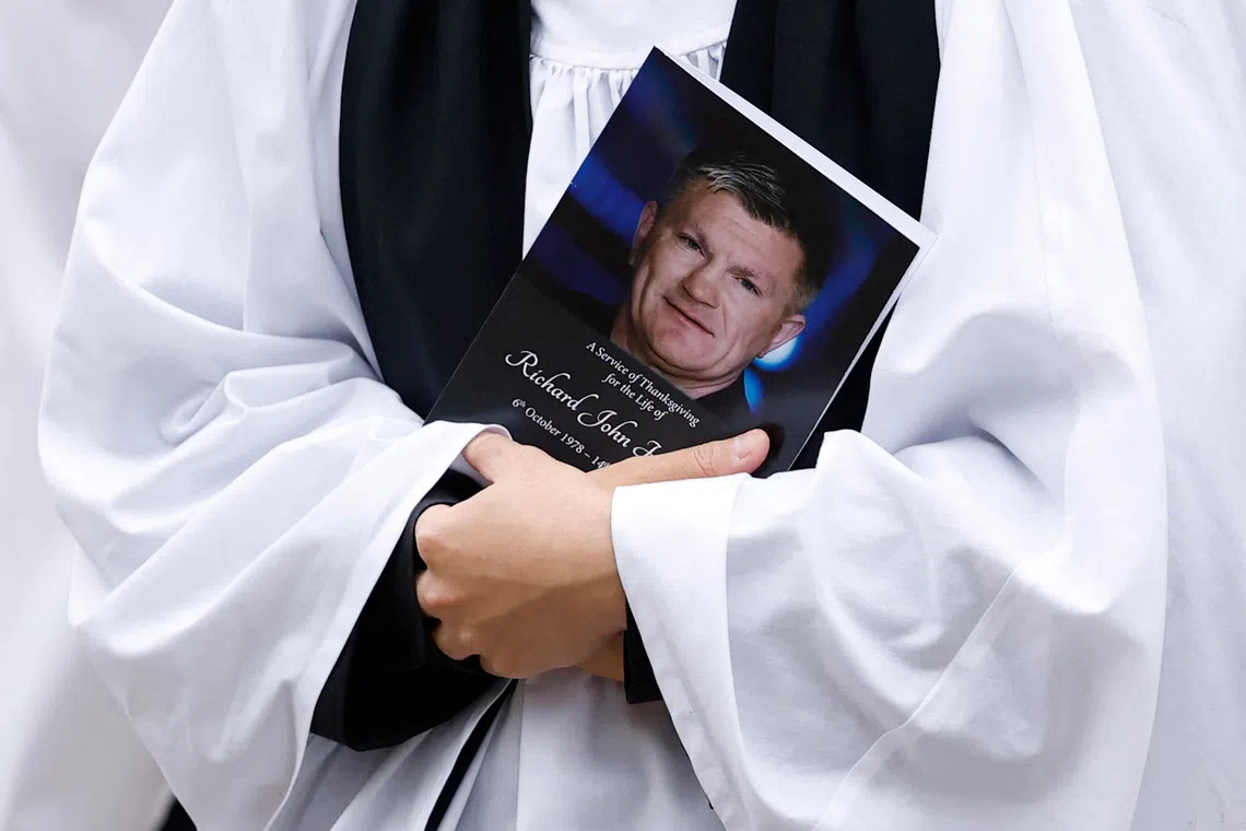 Boxing - Funeral of former boxer Ricky Hatton - Manchester Cathedral, Manchester, Britain - October 10, 2025 General view of the order of service at the funeral of former boxer Ricky Hatton Action Images via Reuters/Jason Cairnduff