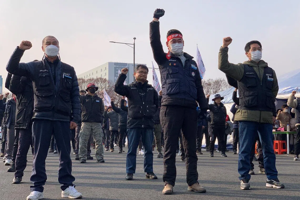 Truckers holding a strike at a terminal of an Inland Container Depot in Uiwang, near Seoul, on Dec 9, 2022.