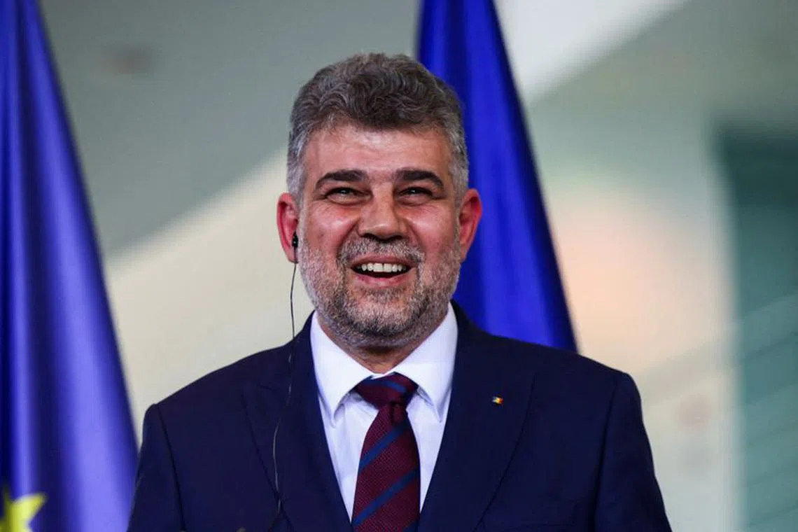 FILE PHOTO: Romanian Prime Minister Marcel Ciolacu reacts during a press conference with German Chancellor Olaf Scholz, at the Chancellery in Berlin, Germany July 4, 2023. REUTERS/Lisi Niesner/File Photo