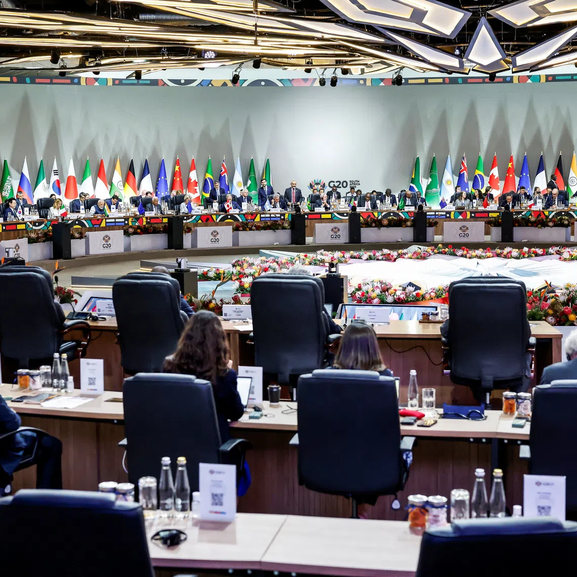 Leaders attend a plenary session on the second day of the G20 Leaders' Summit at the Nasrec Expo Centre in Johannesburg on November 23, 2025.     MARCO LONGARI/Pool via REUTERS
