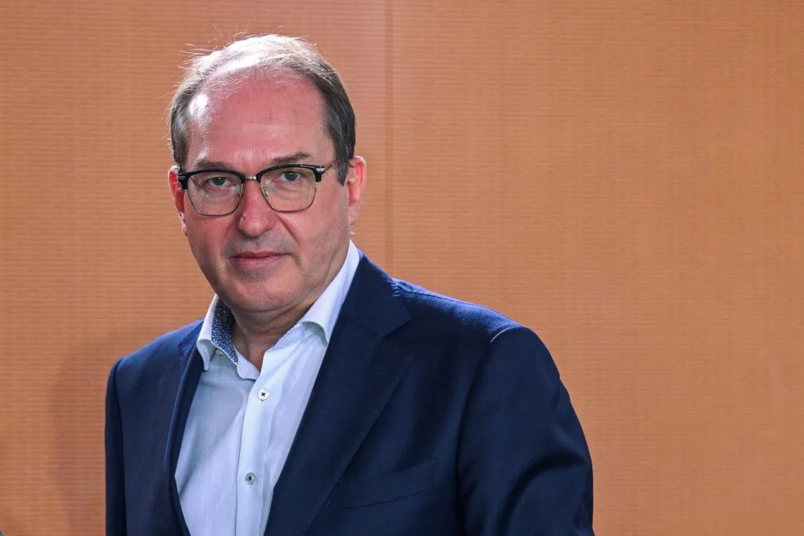 FILE PHOTO: German Interior Minister Alexander Dobrindt attends a cabinet meeting at the Chancellery in Berlin, Germany July 23, 2025. REUTERS/Annegret Hilse/File Photo
