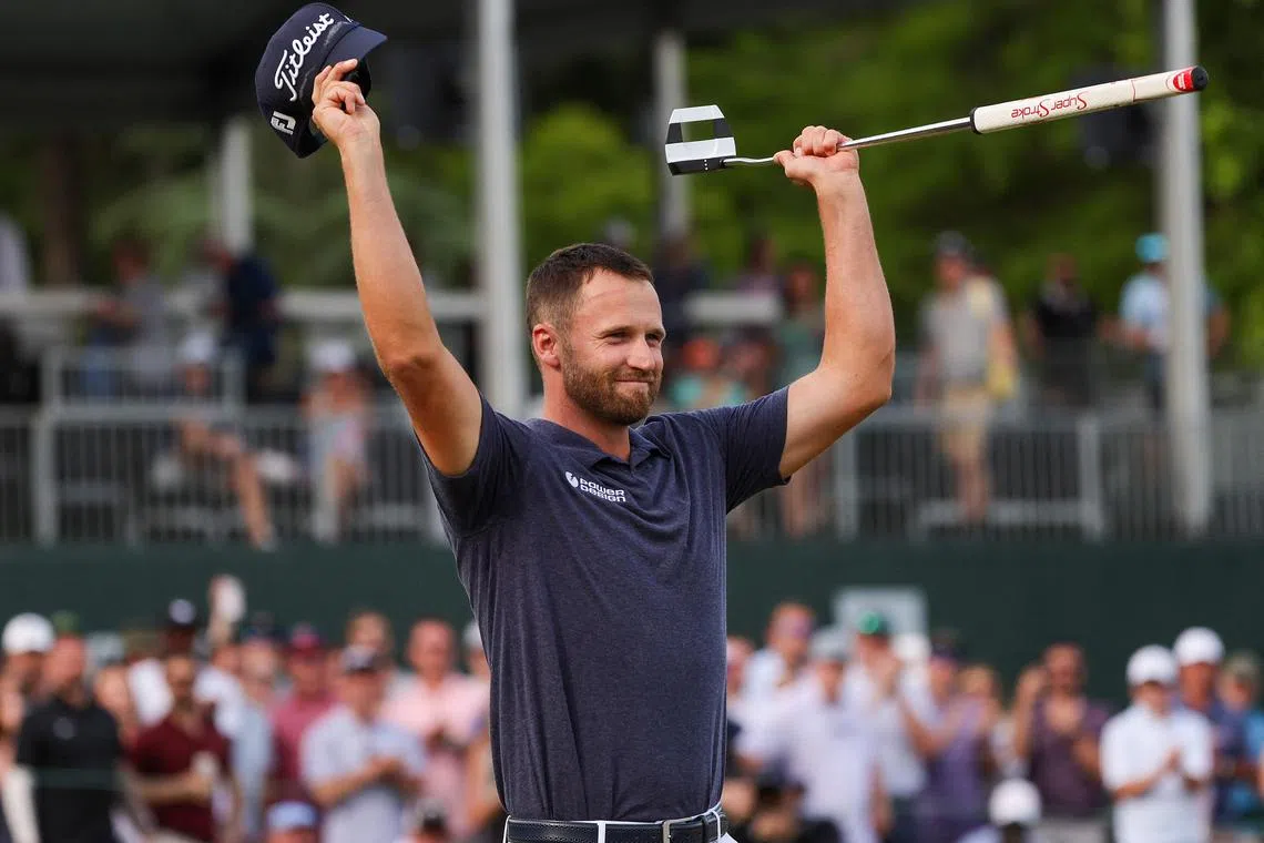 Wyndham Clark celebrates winning on the 18th green during the final round of the Wells Fargo Championship on May 7, 2023.
