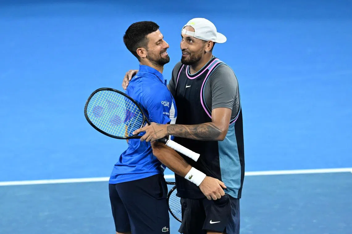 Nick Kyrgios (right) of Australia and Novak Djokovic of Serbia celebrating after winning their doubles match against Alexander Erler of Austria and Andreas Mies of Germany  6-4, 6-7 (4/7), 10-8 at the Brisbane International tennis tournament on Dec 30.