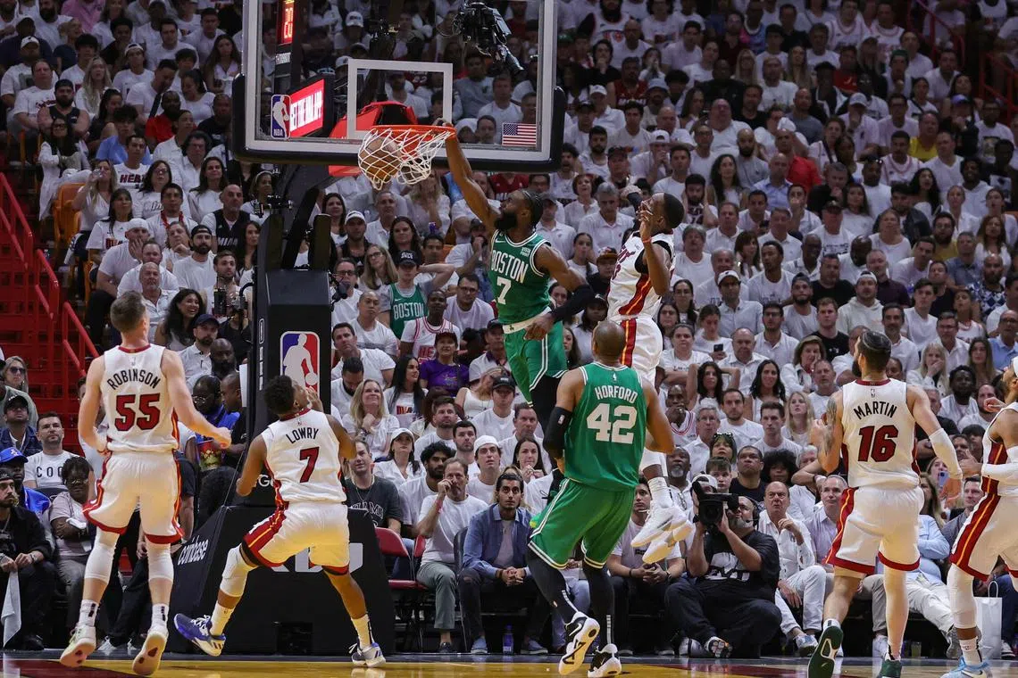 Jaylen Brown of the Boston Celtics dunks the ball against the Miami Heat during Game 4 of the NBA Eastern Conference Finals.