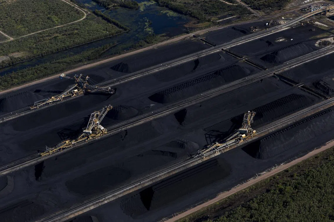 FILE — Coal awaiting export at the Abbot Point terminal in Queensland, Australia, not far from the Adani group’s Carmichael Coal mine, on July 5, 2017.  (David Maurice Smith/The New York Times)