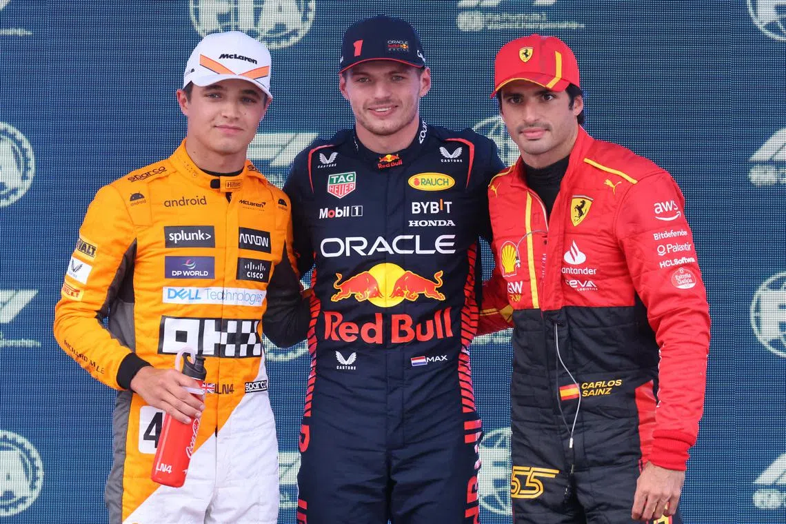 Red Bull's Max Verstappen (centre) celebrating after qualifying in pole position for the F1 Spanish Grand Prix in Barcelona, with second-placed Carlos Sainz (left) from Ferrari and third-placed McLaren's Lando Norris.