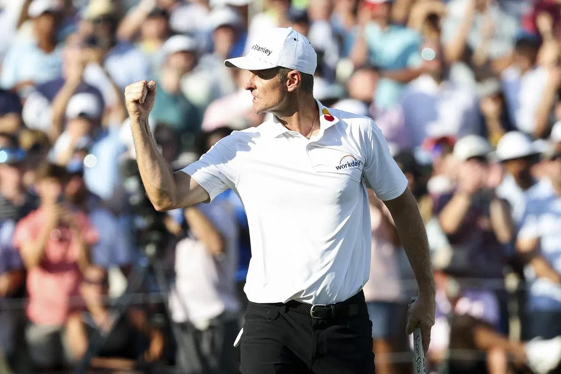 Justin Rose of England celebrating after making a birdie on the 18th hole during a play-off against J.J. Spaun during the final round of the FedEx St. Jude Championship on Aug 10.