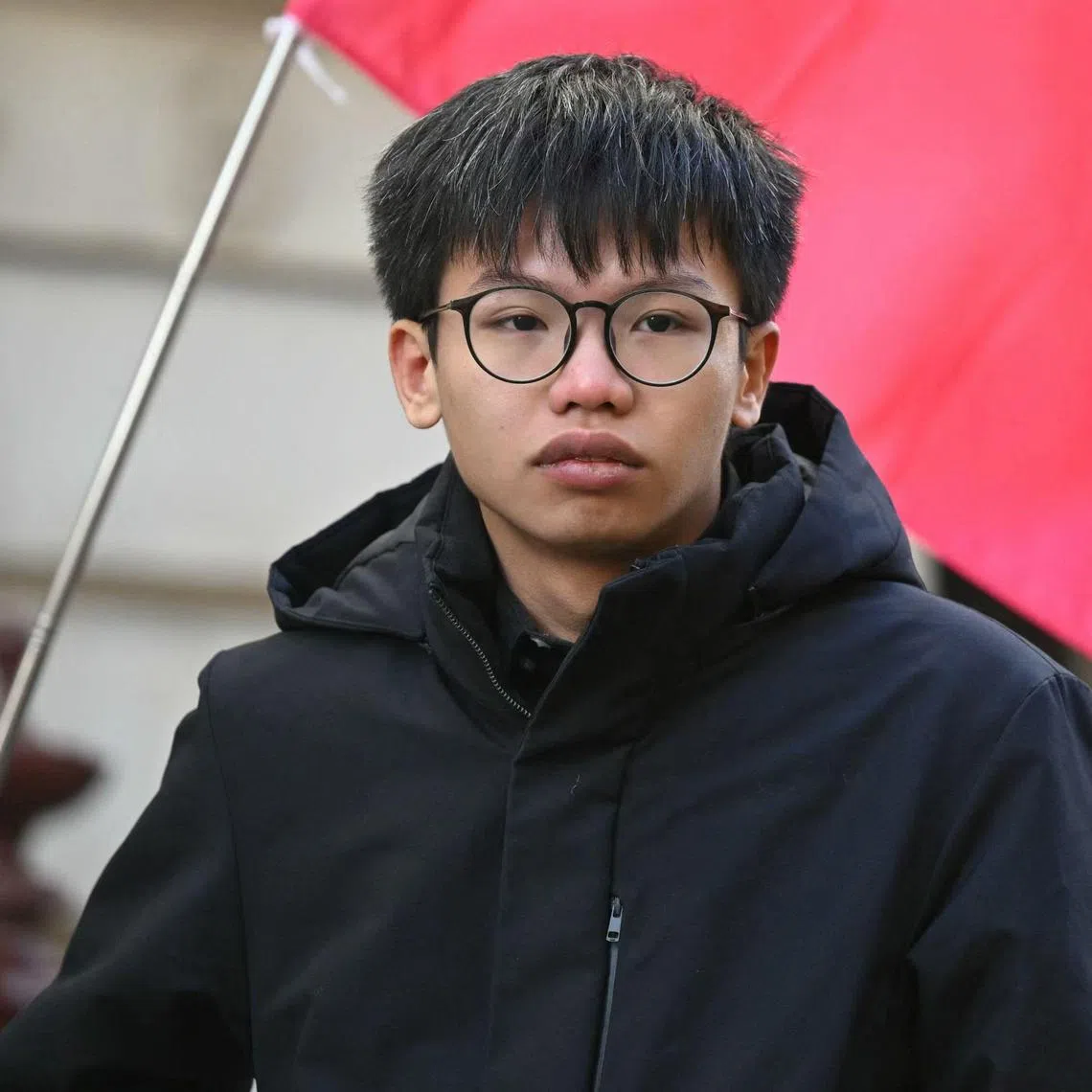 In this 2024 photo, political activist Tony Chung is seen attending a demonstration outside the Foreign and Commonwealth Development Office in London to protest the introduction of the Article 23 National Security Law in Hong Kong. 