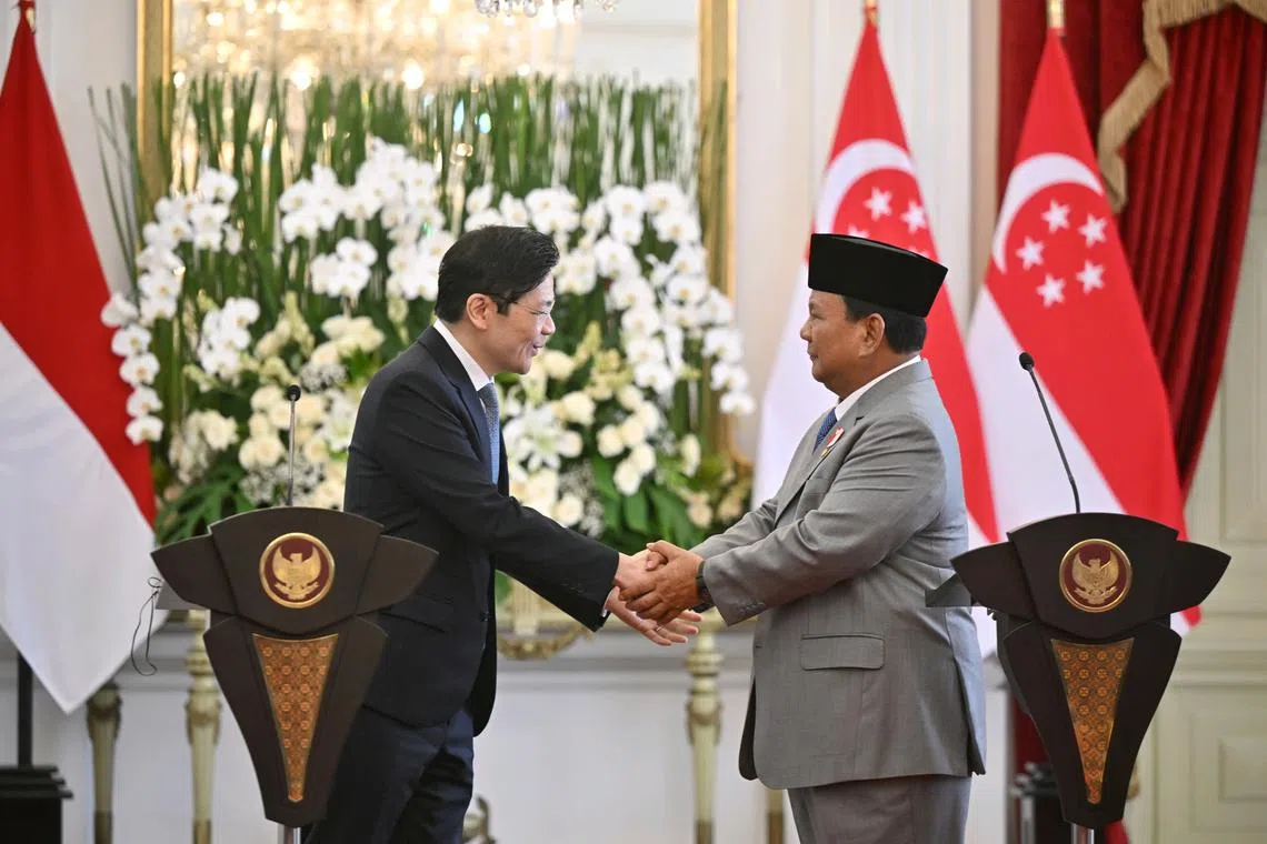 PM Lawrence Wong and Indonesian President Prabowo Subianto at a joint press conference at the presidential palace in Jakarta on Nov 6.