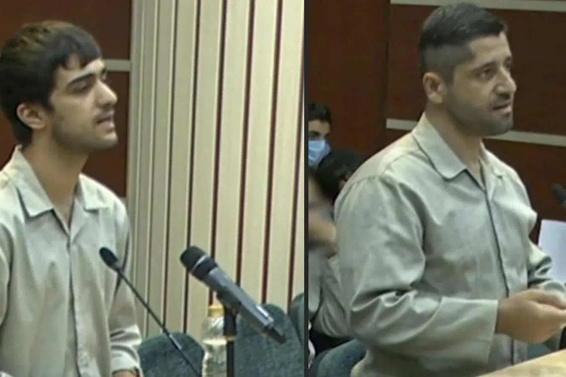 A still image from video shows Mohammad-Mehdi Karami (left) and Seyyed Mohammad Hosseini speaking in a Teheran court on Dec 5, 2022.