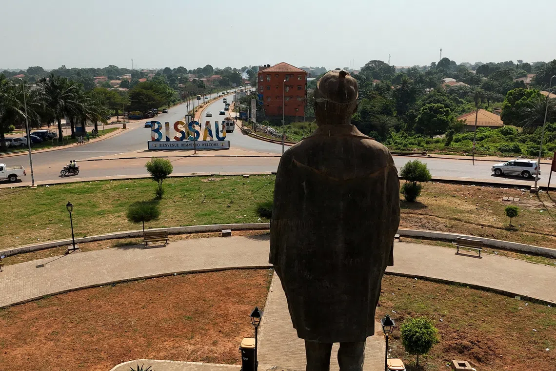 FILE PHOTO: A drone view shows a statue of Amilcar Lopes Cabral, an anti-colonial leader who led Guinea-Bissau's independence movement as head of the African Party for the Independence of Guinea and Cape Verde (PAIGC), in Bissau, Guinea-Bissau, November 24, 2025. REUTERS/Luc Gnago/File Photo