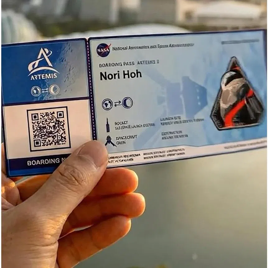 Local singer Derrick Hoh with his daughter Nori. He shares a video of a commemorative virtual Artemis II boarding pass with Nori's name.