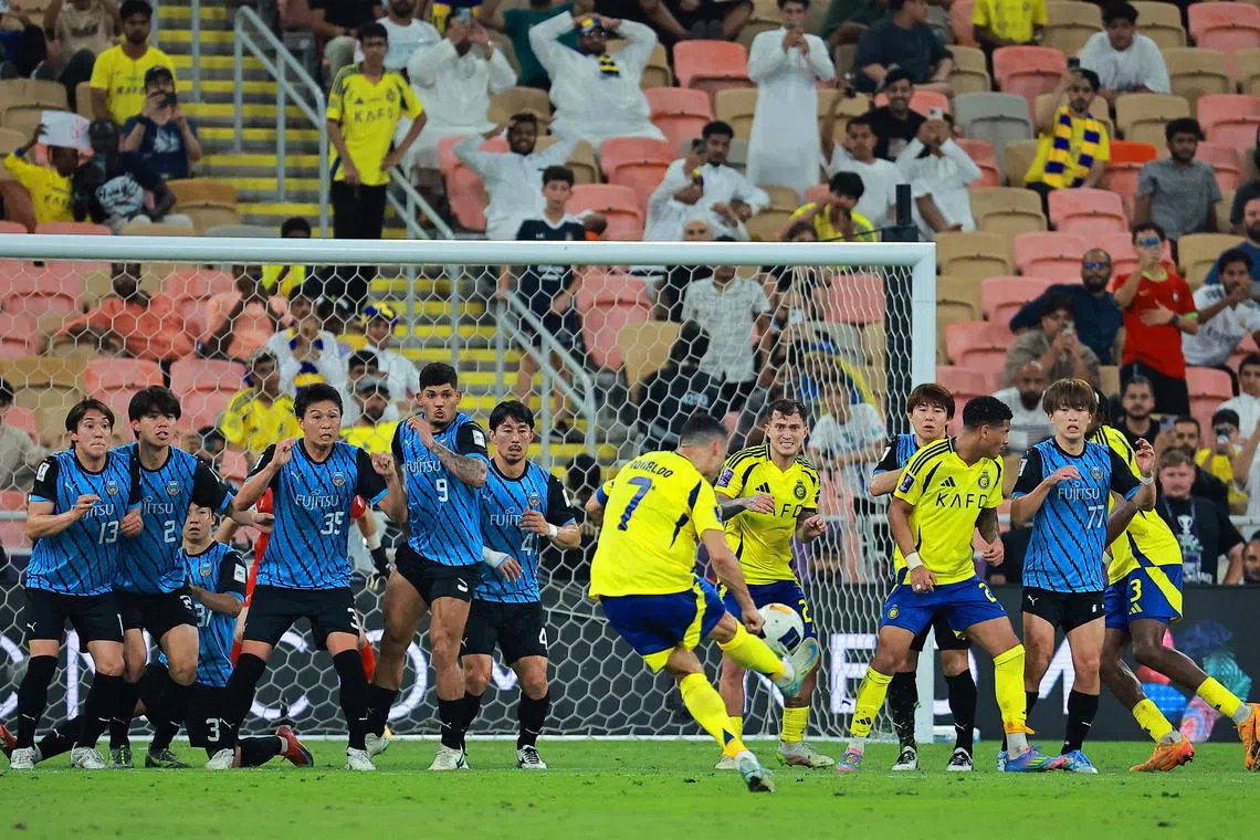 Soccer Football - Asian Champions League - Semi Final - Al Nassr v Kawasaki Frontale - King Abdullah Sports City, Jeddah, Saudi Arabia - April 30, 2025  Al Nassr's Cristiano Ronaldo shoots at goal from a free kick REUTERS/Stringer