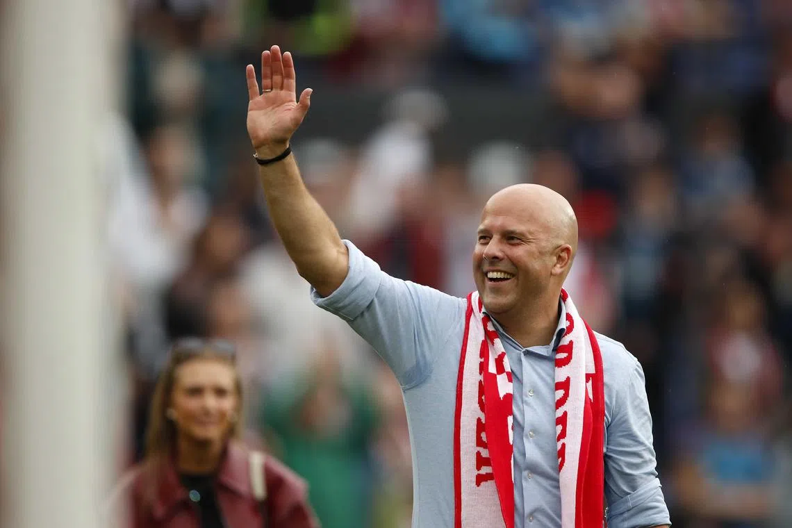 Feyenoord coach Arne Slot waves goodbye to fans as he prepares to take up the Liverpool hot seat next season.
