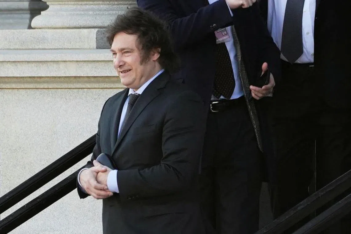 Argentine President-elect Javier Milei departs the Eisenhower Executive Office Building after meeting with Biden administration staff at the White House complex in Washington, U.S., November 28, 2023. REUTERS/Kevin Lamarque