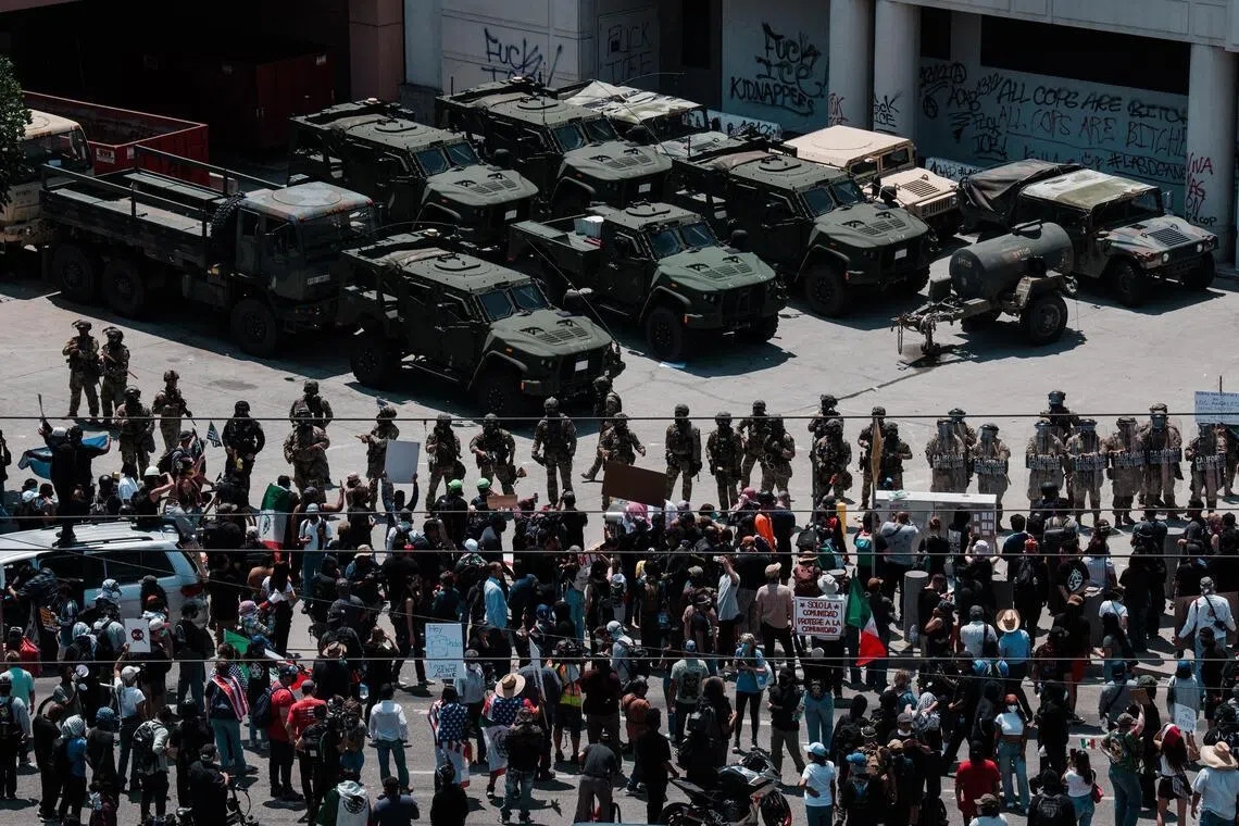 The California National Guard controls crowds in Los Angeles, on June 8, 2025.