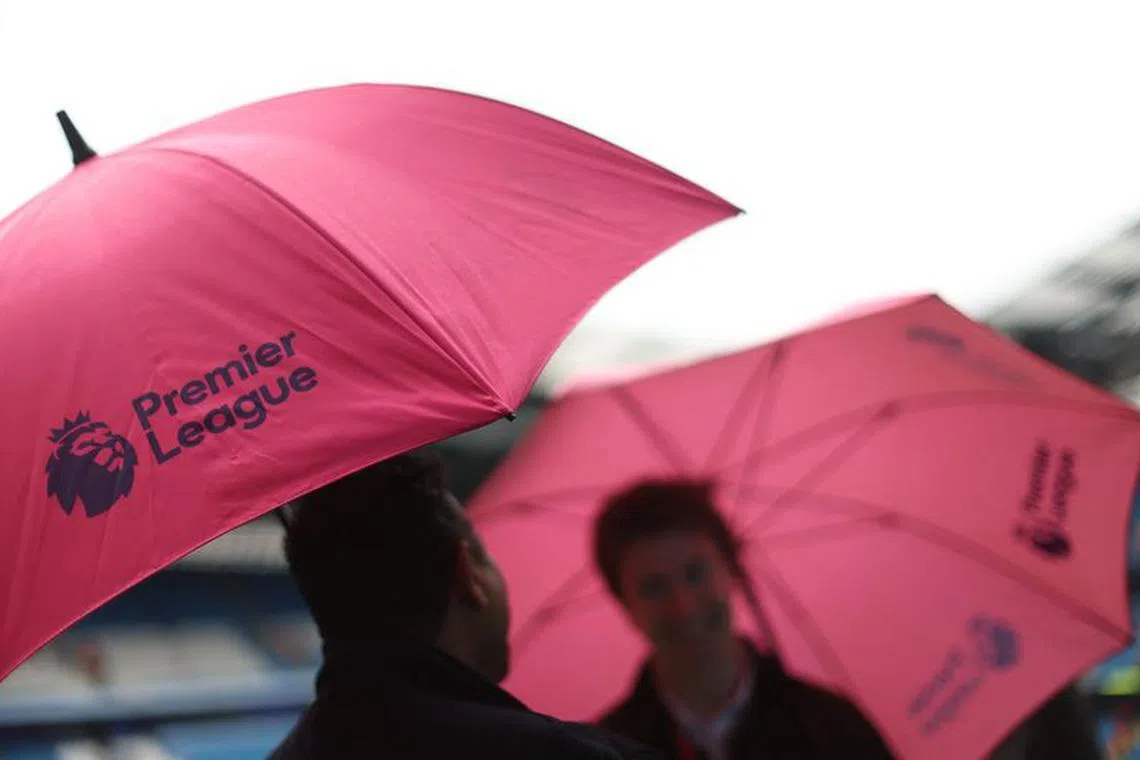FILE PHOTO: Soccer Football - Premier League - Manchester City v Fulham - Etihad Stadium, Manchester, Britain - November 5, 2022 General view of the Premier League logo on an umbrella inside the stadium before the match REUTERS/Carl Recine/File Photo