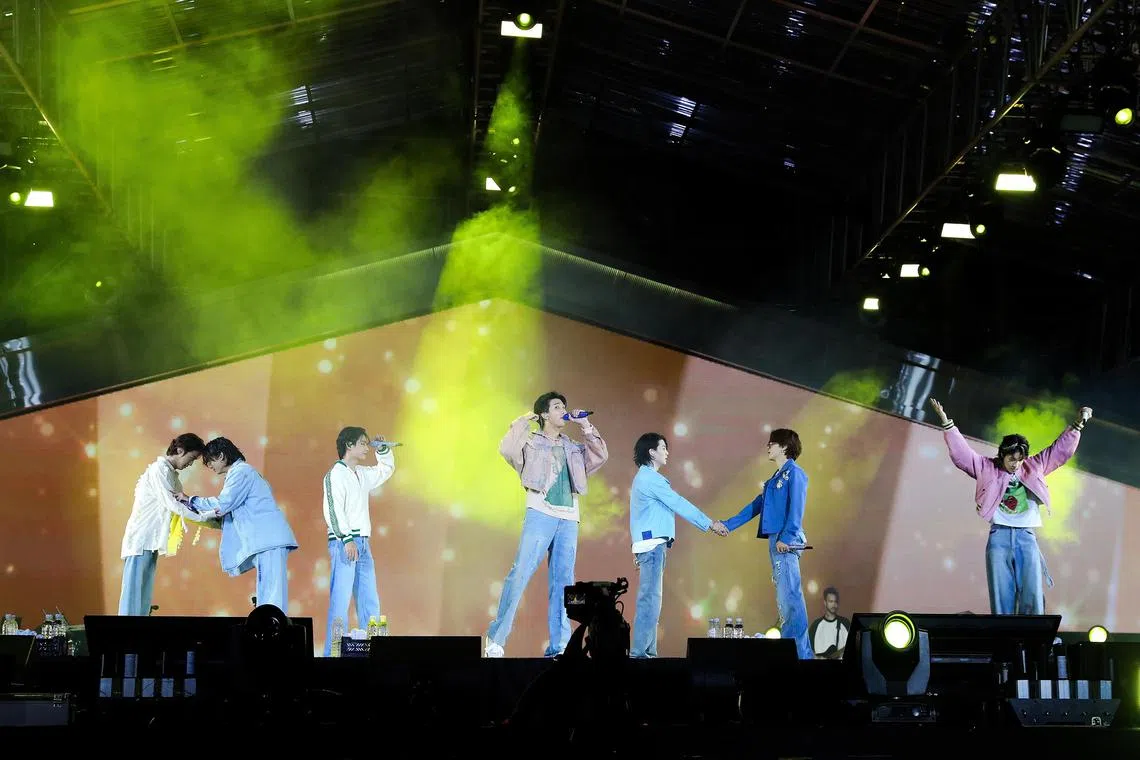 jaera05a - Members of BTS (from left): Jin, Jungkook, V, RM, Suga, Jimin and J-hope at the concert they performed in Busan, South Korea in October 2022. The show is now a concert film available to stream on Prime Video from Nov 9.

PHOTO: PRIME VIDEO