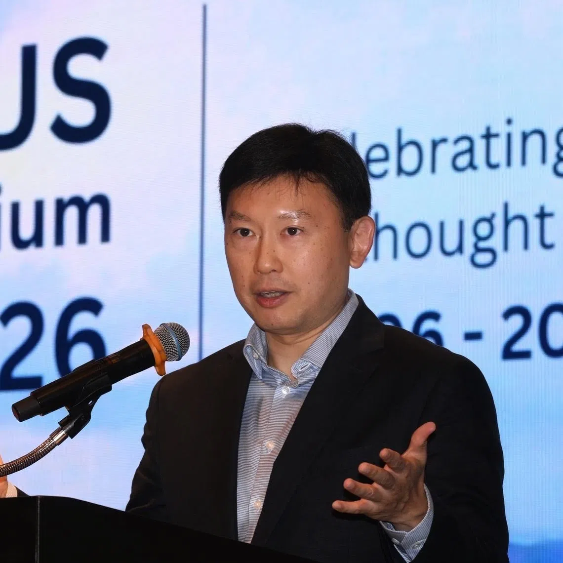 National Development Minister Chee Hong Tat speaking at the IREUS Urban Housing Symposium on May 8.