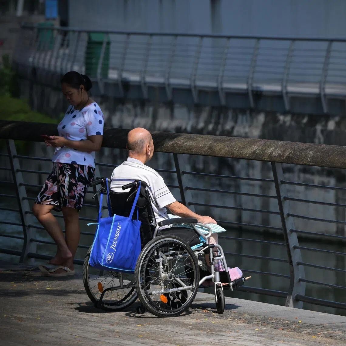 Generic of an elderly man with his helper photographed on July 11, 2024. For stories on the elderly, elderly loneliness, aging society, domestic workers, and more. 