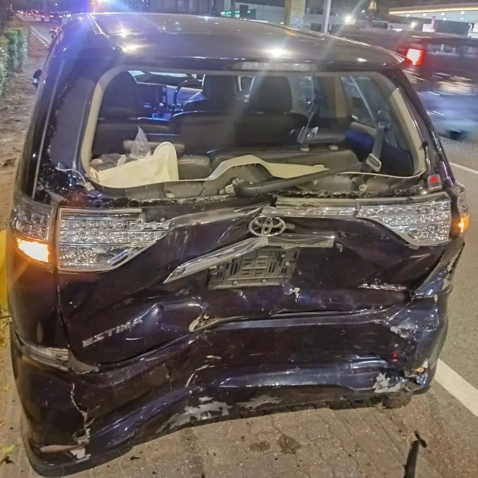 The damaged minivan driven by a Singaporean driver after it was hit by a local driver in Johor Bahru.