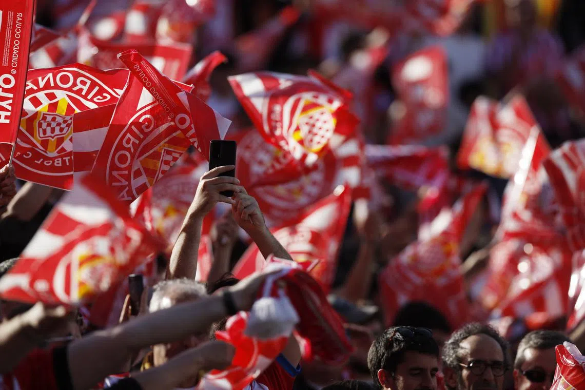 FILE PHOTO: General view of Girona fans inside the stadium before a match at Estadi Montilivi, Girona, Spain, May 4, 2024. REUTERS/Albert Gea/File Photo