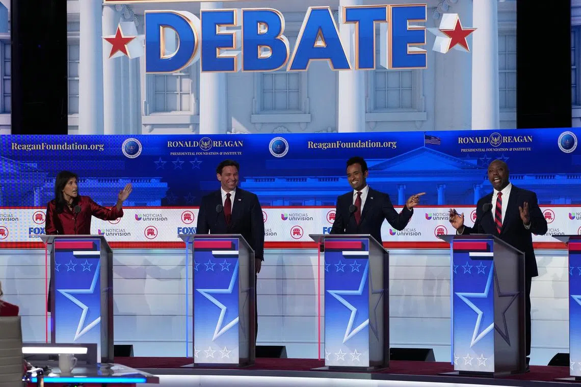 From left, former South Carolina Gov. Nikki Haley, Florida Gov. Ron DeSantis, the entrepreneur Vivek Ramaswamy and Sen. Tim Scott (R-S.C.) on stage during the second Republican presidential debate at the Ronald Reagan Presidential Library in Simi Valley, Calif., Sept. 27, 2023. (Todd Heisler/The New York Times)