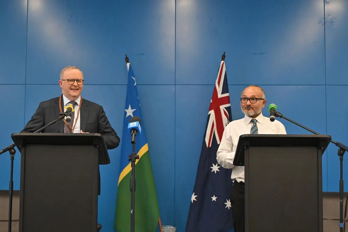 Australian Prime Minister Anthony Albanese (left), who arrived on July 7 in the Solomon Islands capital Honiara, was greeted by newly elected Prime Minister Matthew Wale.