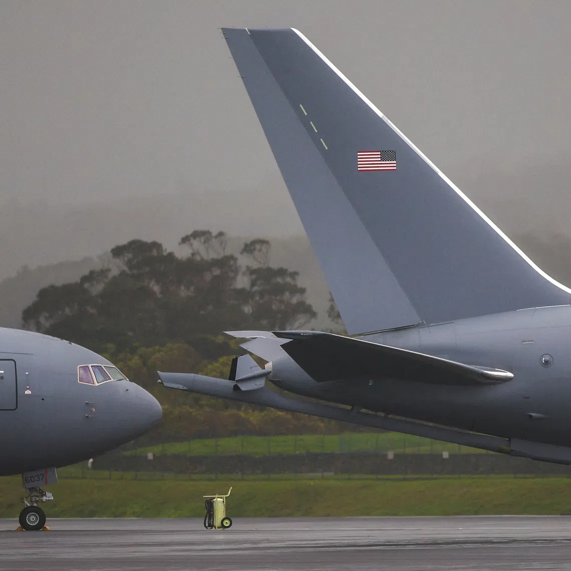 FILE PHOTO: U.S. military planes on the tarmac of Lajes air base in Terceira island, Azores, Portugal, February 21, 2026. REUTERS/Pedro Nunes/File Photo
