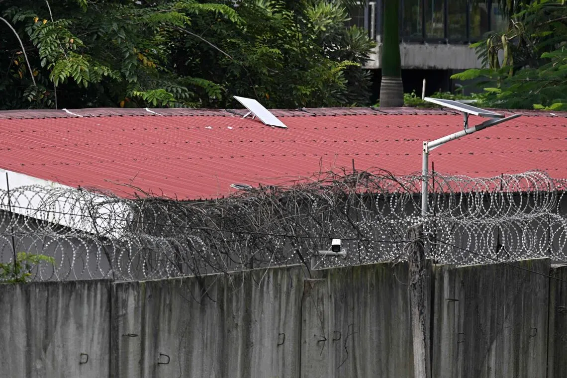 What appears to be a Starlink satellite dish on the roof of a building at the KK Park complex in Myanmar's eastern Myawaddy township, as pictured from Mae Sot district in Thailand's border province of Tak. SpaceX has cut service to more than 2,500 Starlink devices at scam centres in Myanmar, a company vice-president said on Oct 22, 2025, after AFP revealed that the use of the satellite internet terminals had exploded in the illicit industry.