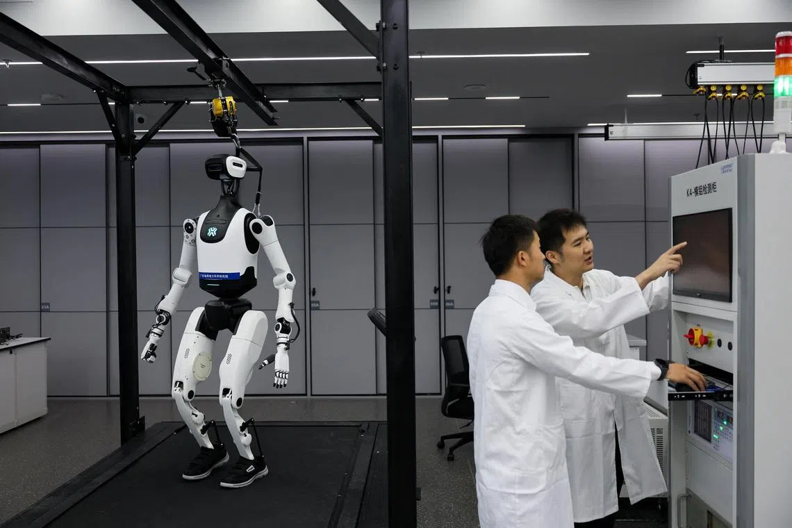 A humanoid robot at a robotics laboratory during a government-organized media trip in Guangzhou, Guangdong province, China, April 16, 2026. REUTERS/Go Nakamura