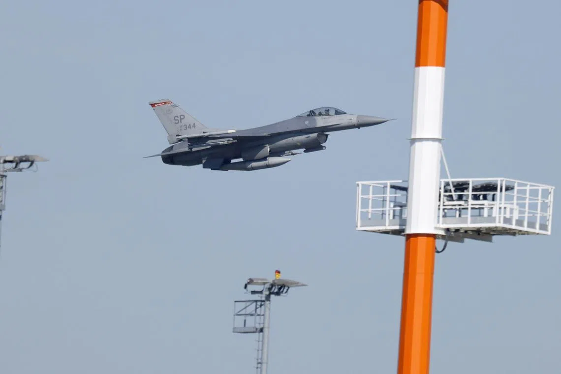 A US Combat fighter F-16 is airborne during the 'Air Defender 2023' exercise at the US airbase in Spangdahlem, Germany.