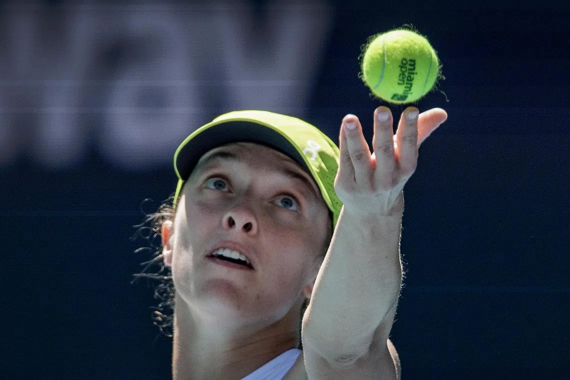 Poland's Iga Swiatek in action against Caroline Garcia of France.