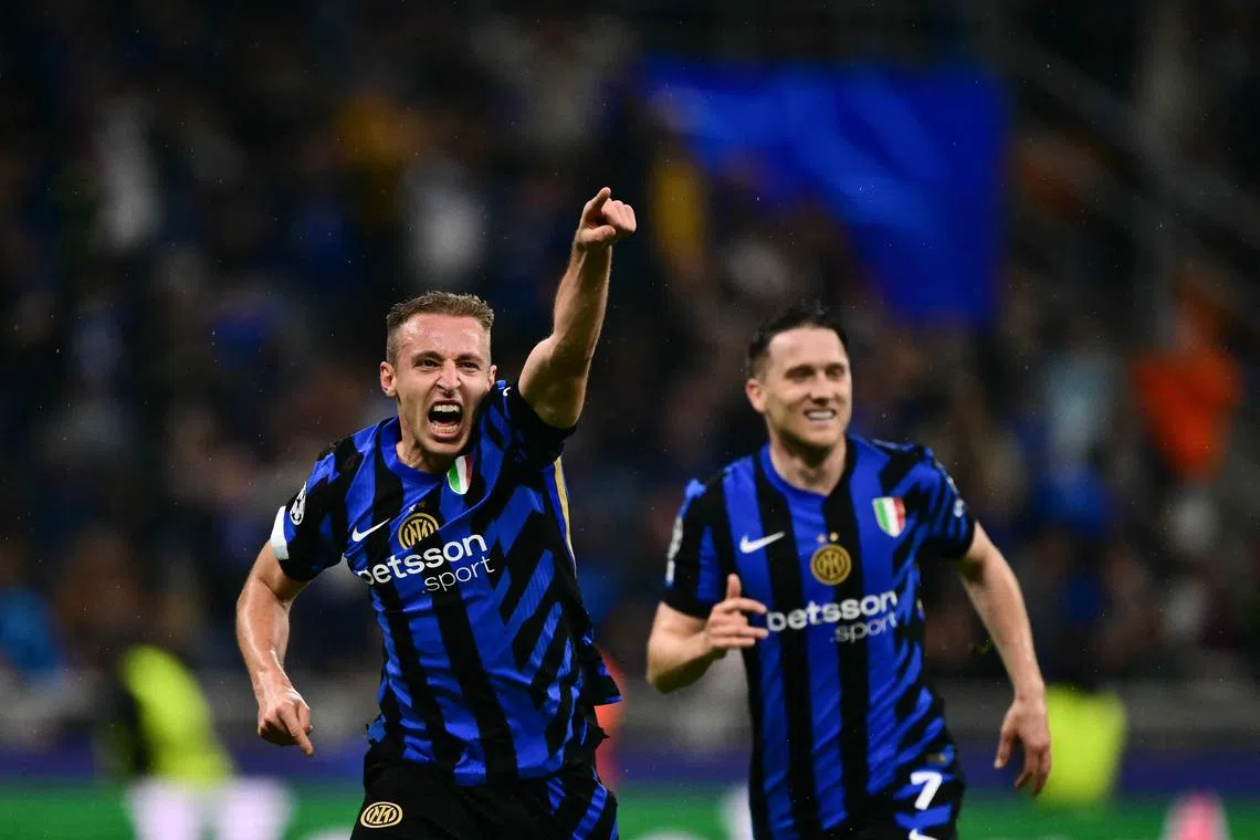 Inter Milan's Davide Frattesi (left) celebrates scoring his team's fourth goal.