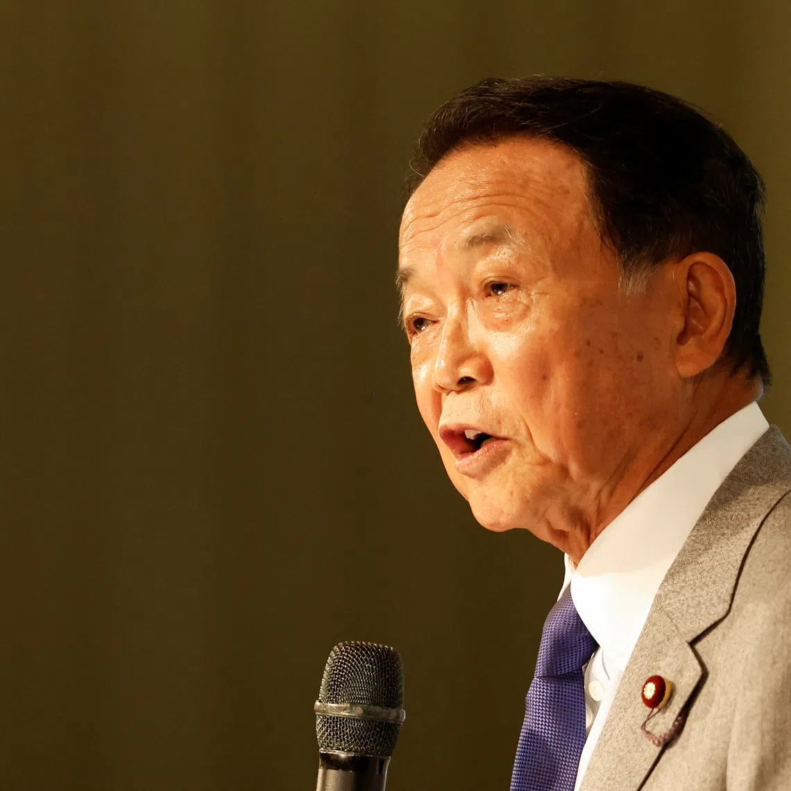 Japan's Former Prime Minister and current Vice-President of the ruling Liberal Democratic Party, Taro Aso, speaks during the Ketagalan Forum in Taipei, Taiwan August 8, 2023. REUTERS/Carlos Garcia Rawlins