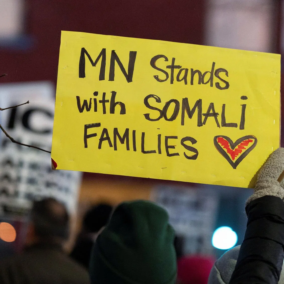 Demonstrators rally in protest against Immigration and Customs Enforcement (ICE), amid a reported federal immigration operation targeting the Somali community, in Minneapolis, Minnesota, U.S. December 8, 2025.  REUTERS/Tim Evans