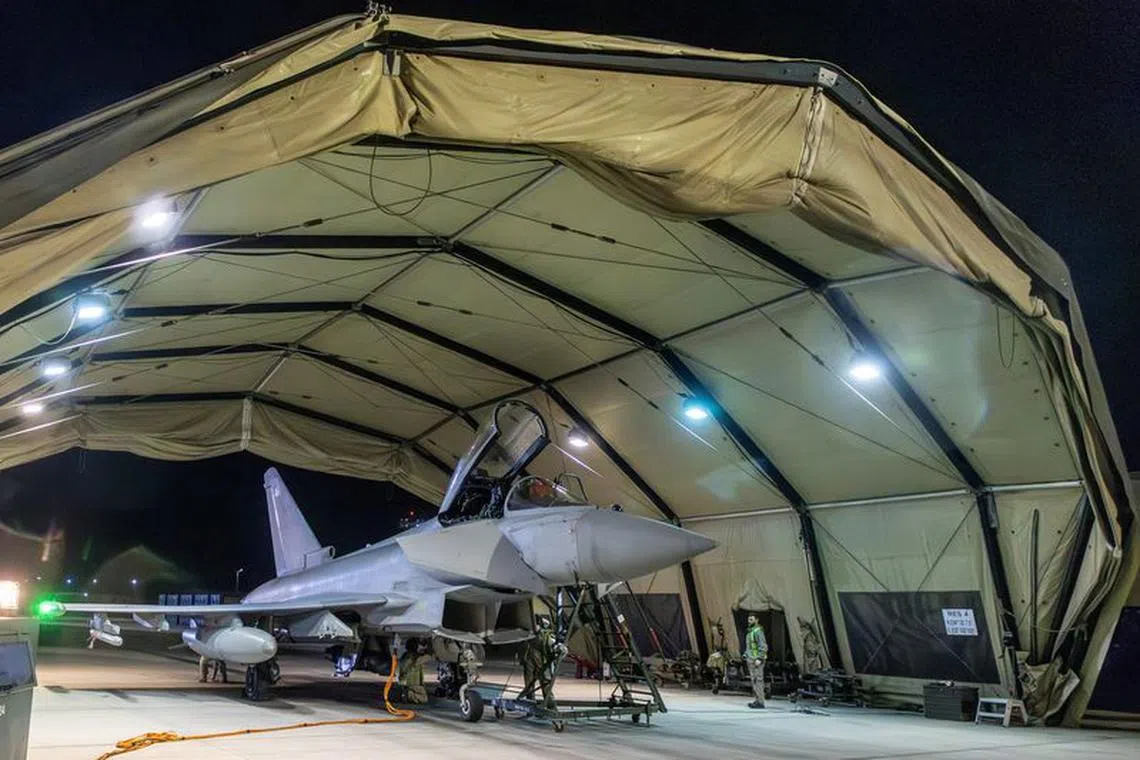 An RAF Typhoon aircraft is pictured at RAF Akrotiri following its return after striking military targets in Yemen during the U.S.-led coalition operation, aimed at the Iran-backed Houthi militia that has been targeting international shipping in the Red Sea, in Cyprus, in this handout picture released on January 12, 2024.   Sgt Lee Goddard/UK MOD/Handout via REUTERS
