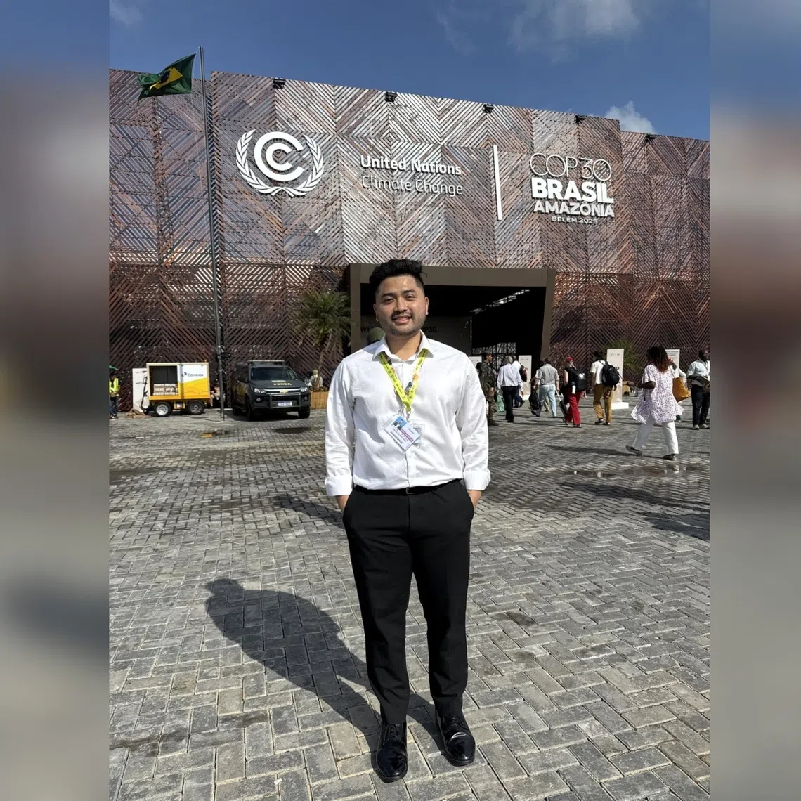 Zaheer Abdul Malik, a NUS undergraduate, outside the COP30 venue in Belem, Brazil.