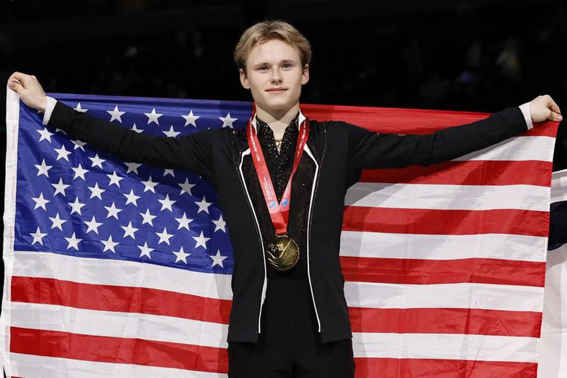 Figure Skating - ISU Grand Prix of Figure Skating - Final - National Indoor Stadium, Beijing, China - December 9, 2023 Gold medallist Ilia Malinin of the U.S. celebrates after winning the senior men's free skating REUTERS/Tingshu Wang
