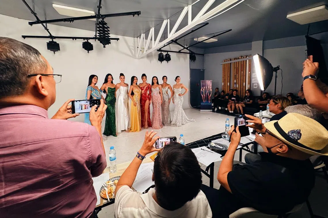 A panel of judges from top Philippine beauty camp Aces and Queens scrutinizes their candidates' performance in a mock pageant held on June 1, 2025 ahead of the Binibining Pilipinas 2025 coronation night.