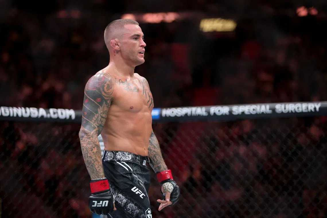 FILE PHOTO: Mar 9, 2024; Miami, Florida, USA; Benoit Saint Denis (blue gloves) fights Dustin Poirier (red gloves) during UFC 299 at Kayesa Center. Mandatory Credit: Sam Navarro-USA TODAY Sports/File Photo