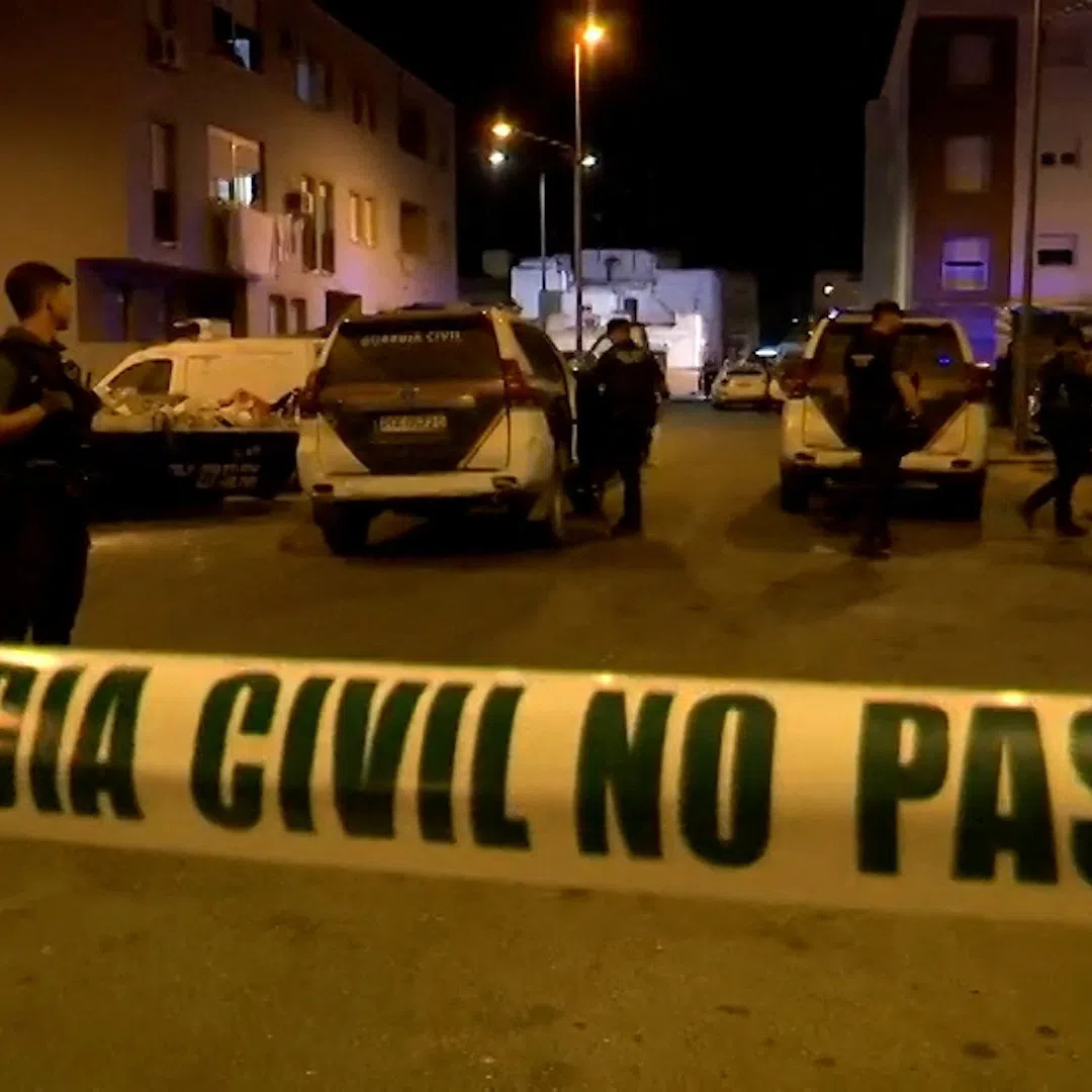 Police officers work at the crime scene where a suspected gang leader's mother-in-law, his pregnant sister and a teenager were killed in a drug-related shooting in Isla Cristina, Spain August 16, 2026. FORTA/Handout via REUTERS