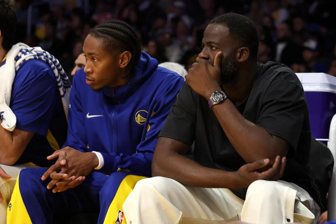Golden State Warriors Draymond Green (right) watching a pre-season game against the Los Angeles Lakers at Crypto.com arena last Saturday.