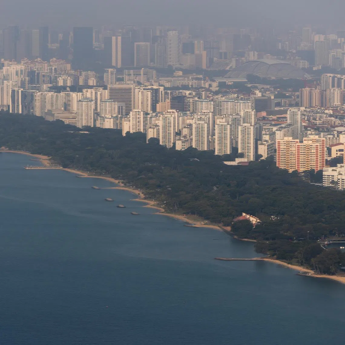 PIXGENERIC Generic pictures. East Coast Park, March 22, 2024. long island, Singapore Strait, housing, HDB, condominium