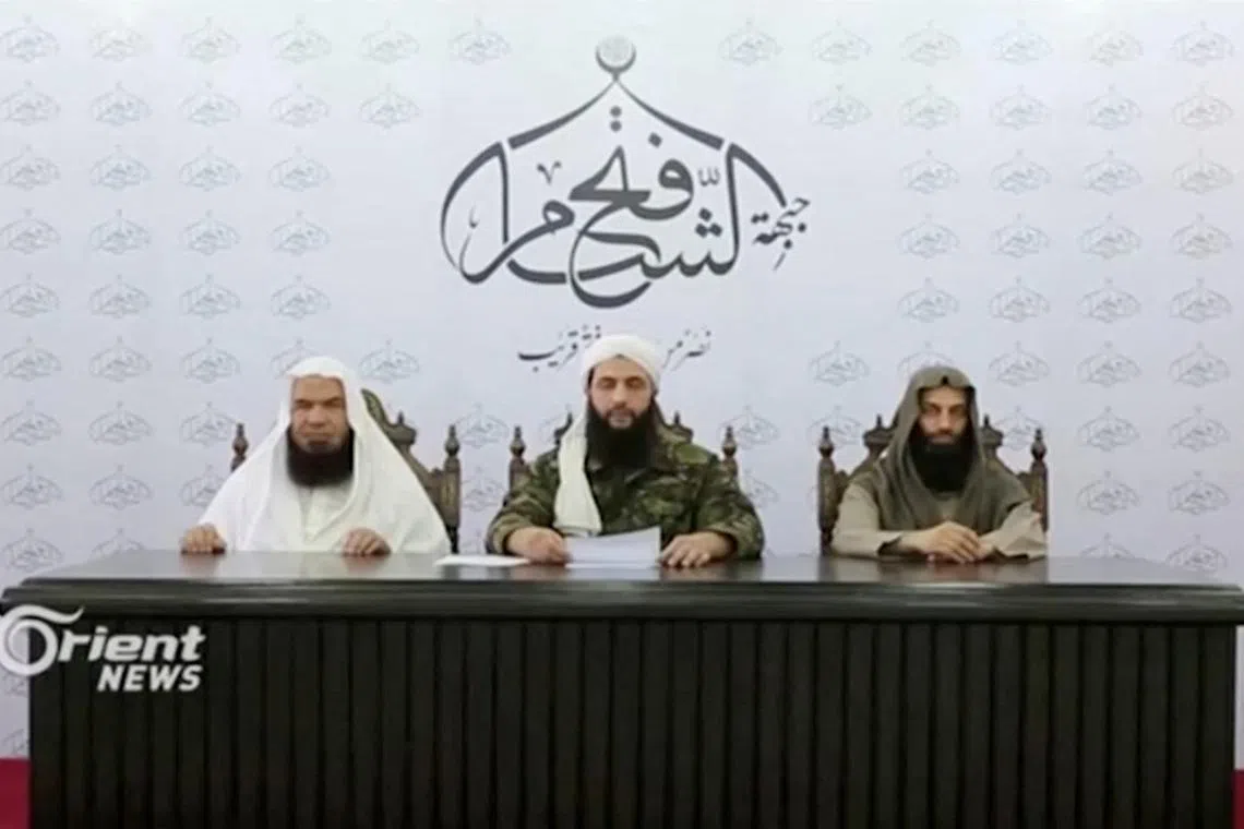 Then-Syrian Islamist rebel group Nusra Front leader Abu Mohammed al-Golani speaks at an unknown location in this still image from 2016 file video obtained December 5, 2024. Orient TV/Reuters TV via REUTERS