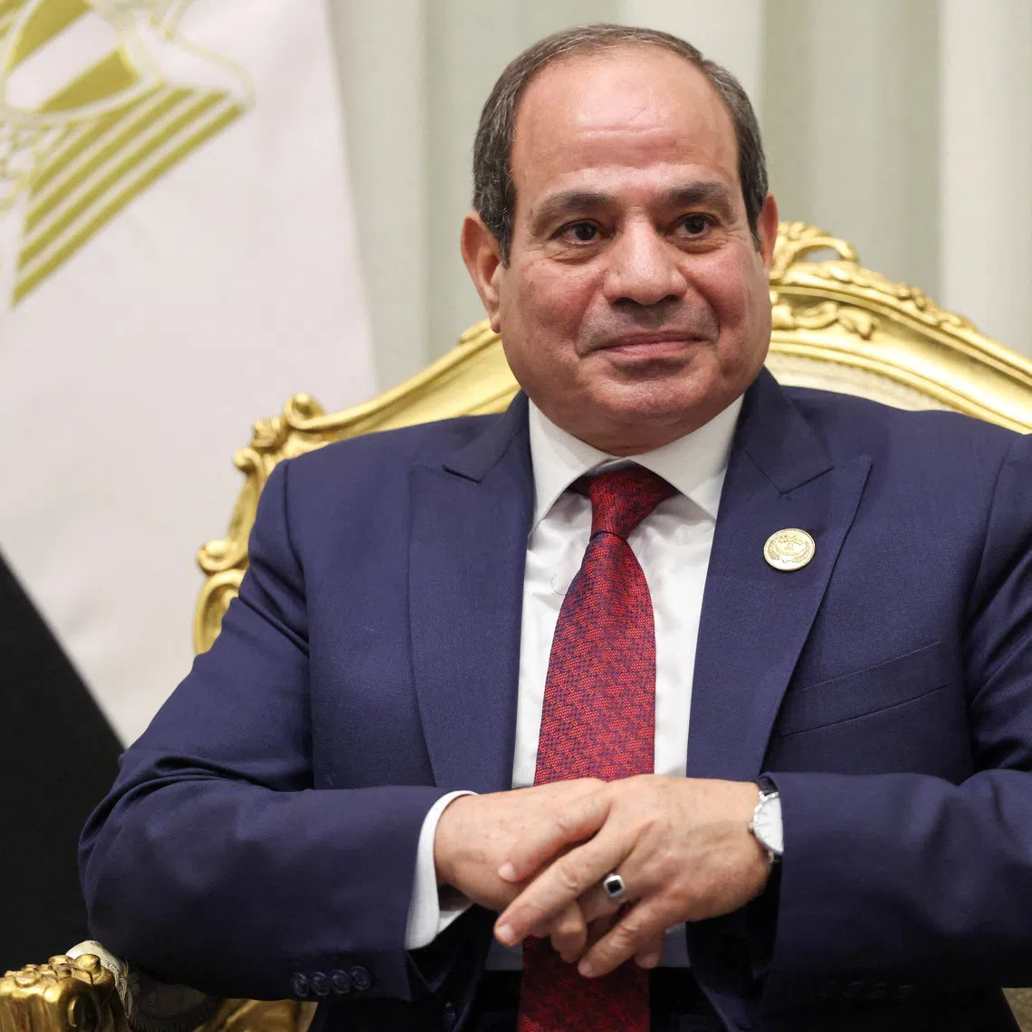 FILE PHOTO: Egyptian President Abdel Fattah el-Sisi looks on during a meeting with U.S. President Donald Trump ahead of a world leaders' summit on ending the Gaza war, amid a U.S.-brokered prisoner-hostage swap and ceasefire deal between Israel and Hamas, in Sharm El-Sheikh, Egypt, October 13, 2025. REUTERS/Evelyn Hockstein/File Photo