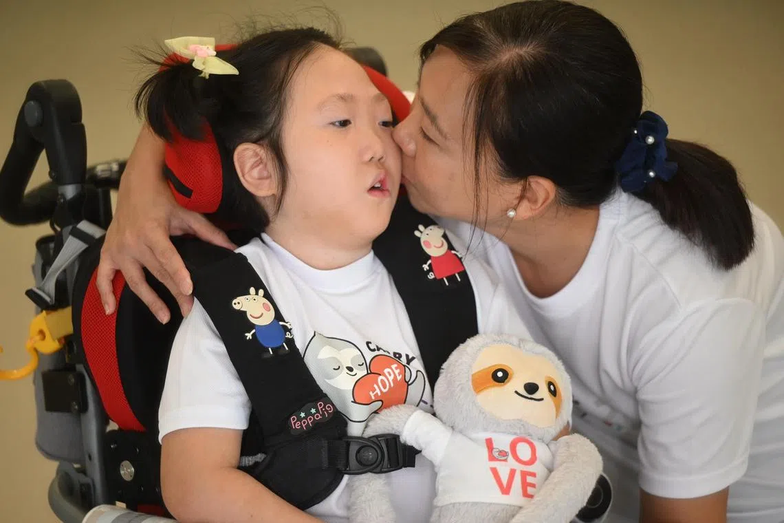 Ms Sheryl Lee, who quit her job to be a caregiver to 