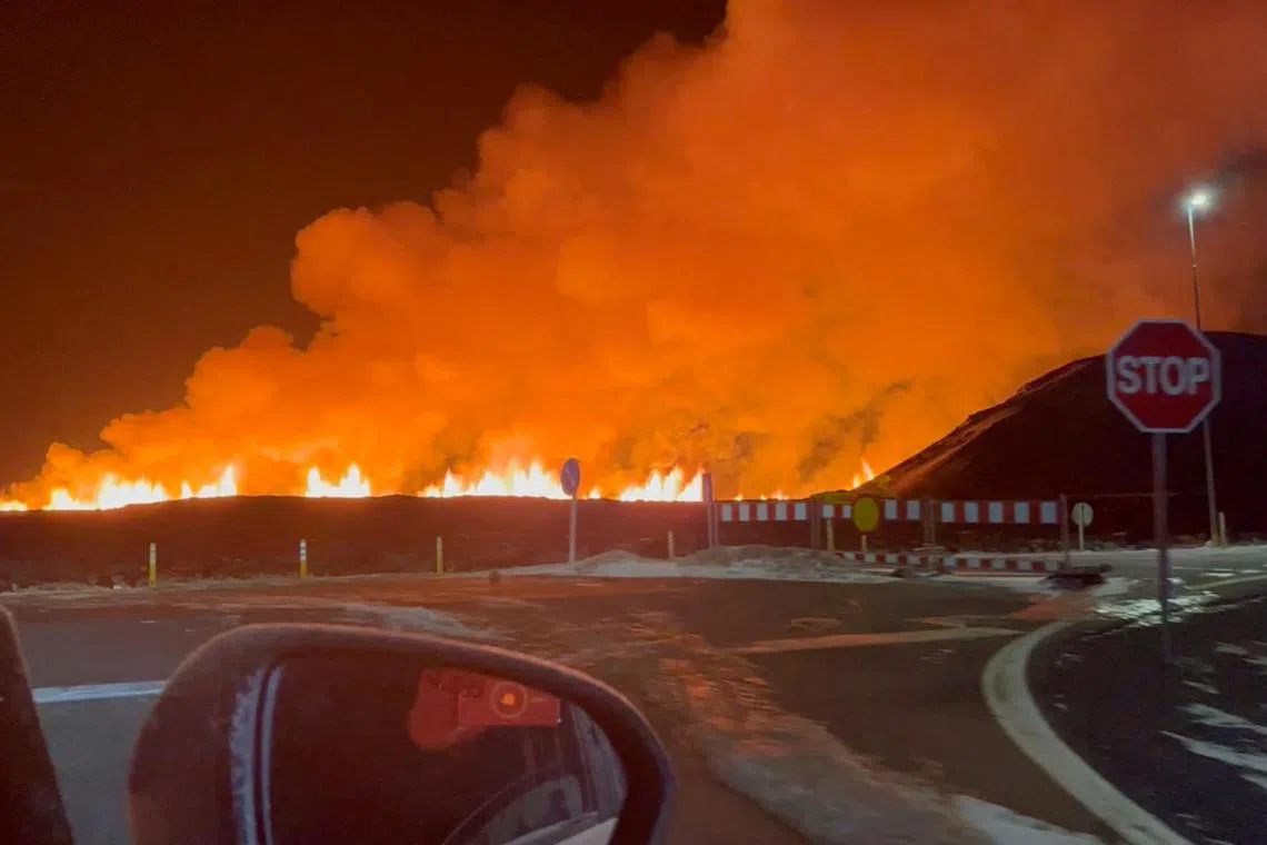 A volcano spews lava and smoke as it erupts, near Grindavik, Iceland, February 8, 2024 in this still image obtained from social media video. Marc Gibbons via REUTERS  THIS IMAGE HAS BEEN SUPPLIED BY A THIRD PARTY. MANDATORY CREDIT. NO RESALES. NO ARCHIVES.