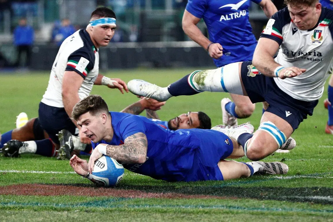 France's Matthieu Jalibert scoring a try in their 29-24 victory over Italy.
