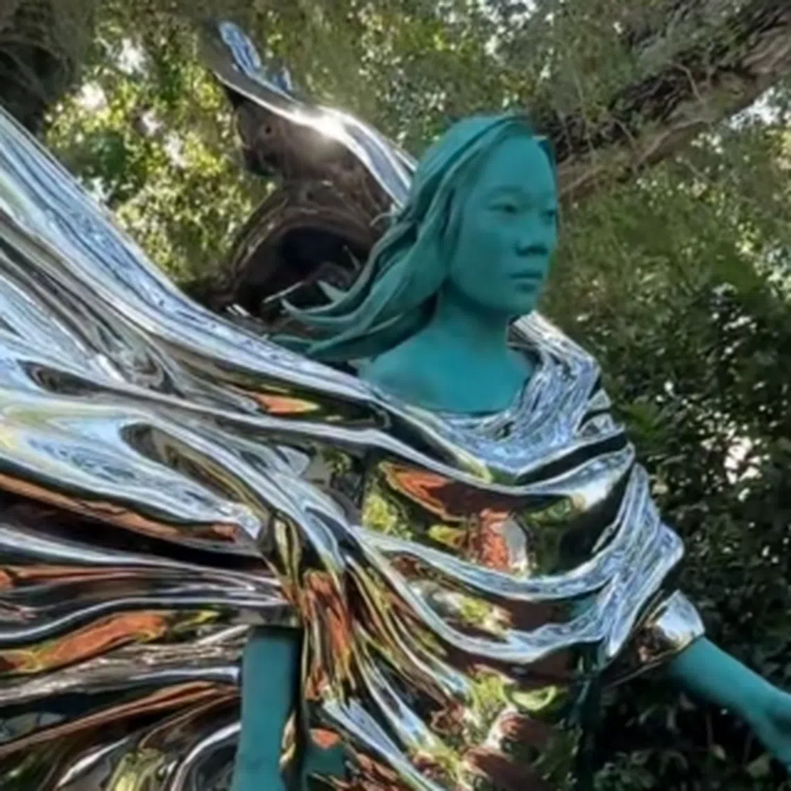 The statue, currently placed under a tree in what looks like the couple’s garden, has prompted varied reactions online. 